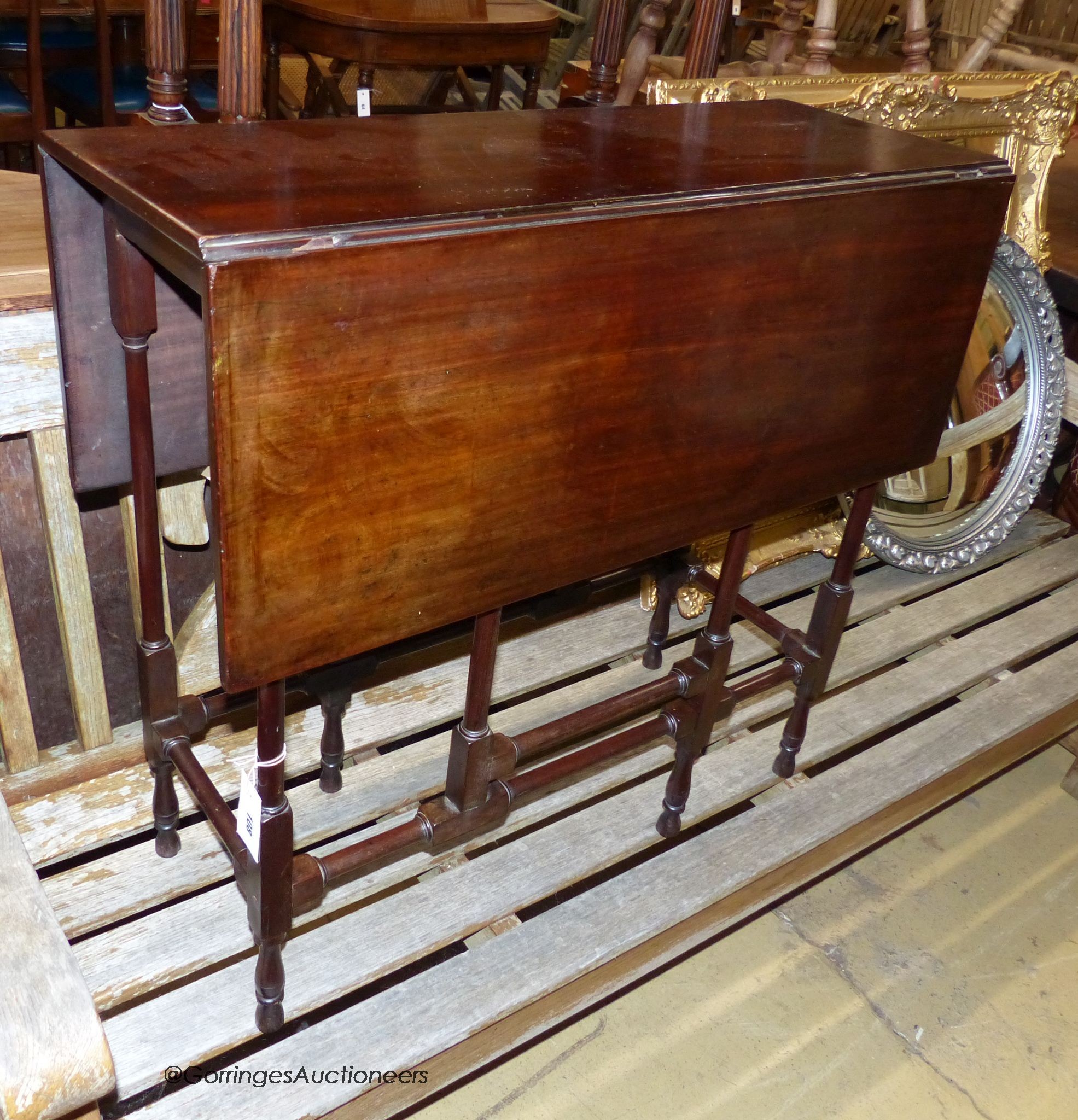An Edwardian mahogany spider leg table, width 76cm, depth 29cm, height 70cm